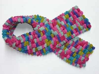 tricoter la laine pompon