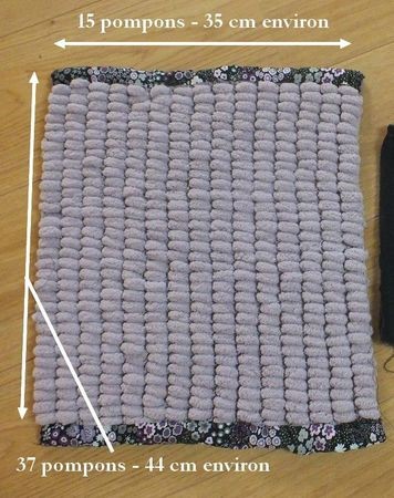 tricoter la laine pompon